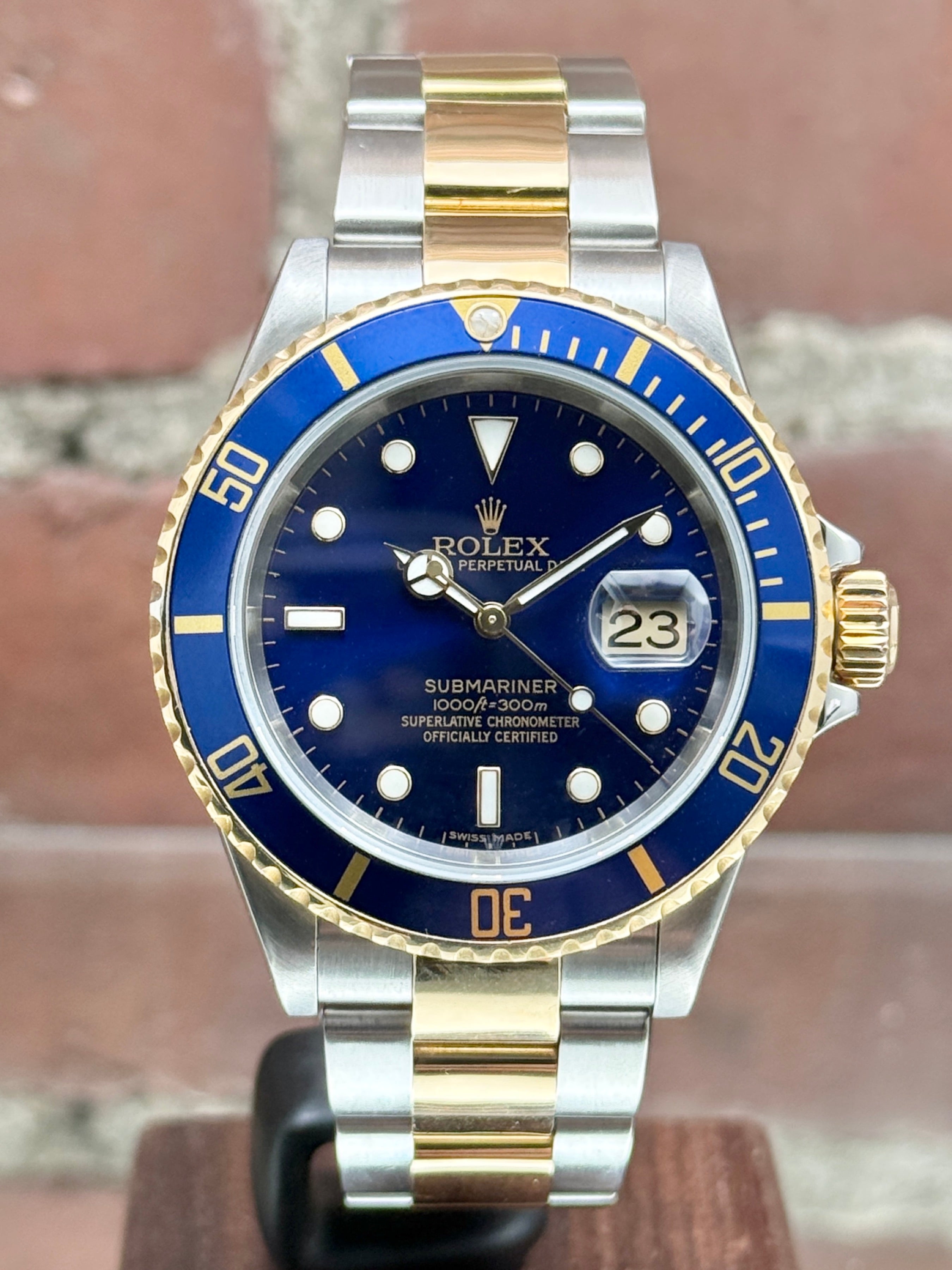 Pre-owned Rolex Submariner 16613 | Gold and Steel Blue
