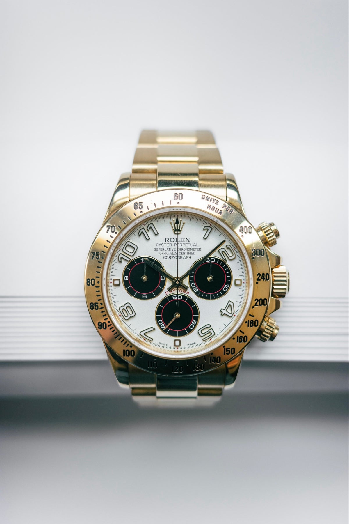 Pre-owned Rolex Daytona 116528 | Yellow gold White