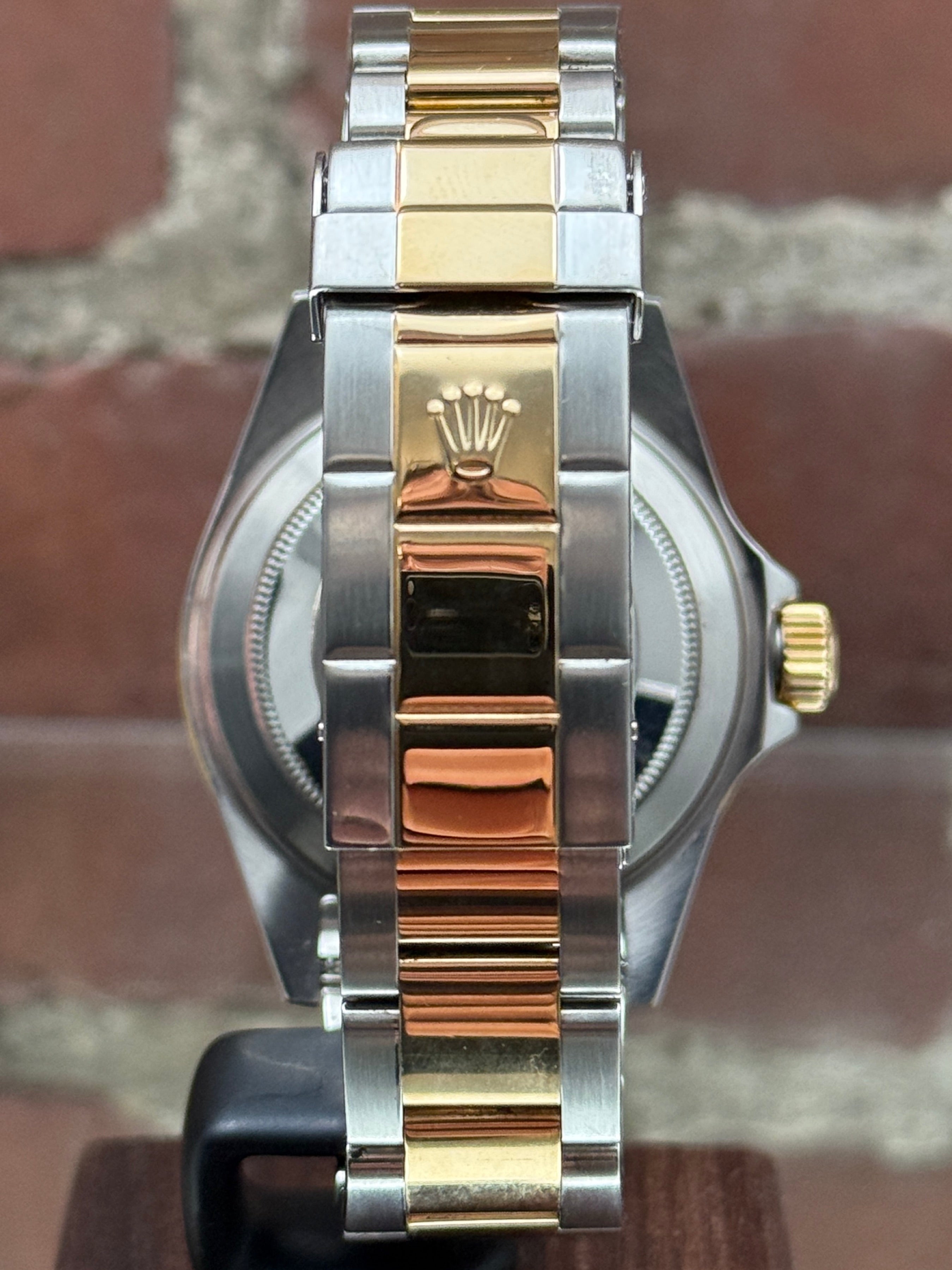 Pre-owned Rolex Submariner Date "Bluesy" 16613 | Gold and steel Blue
