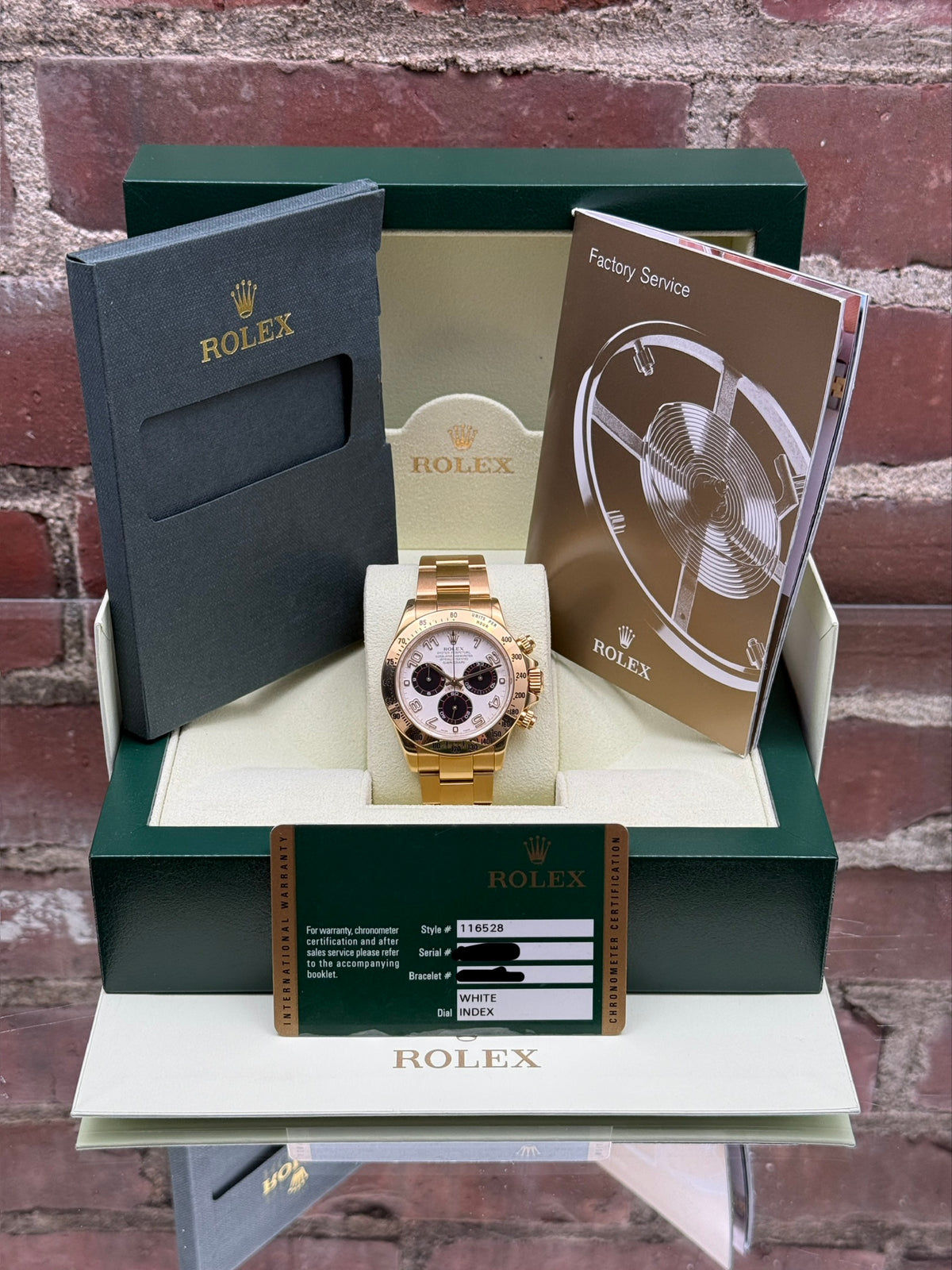 Pre-owned Rolex Daytona 116528 | Yellow gold White