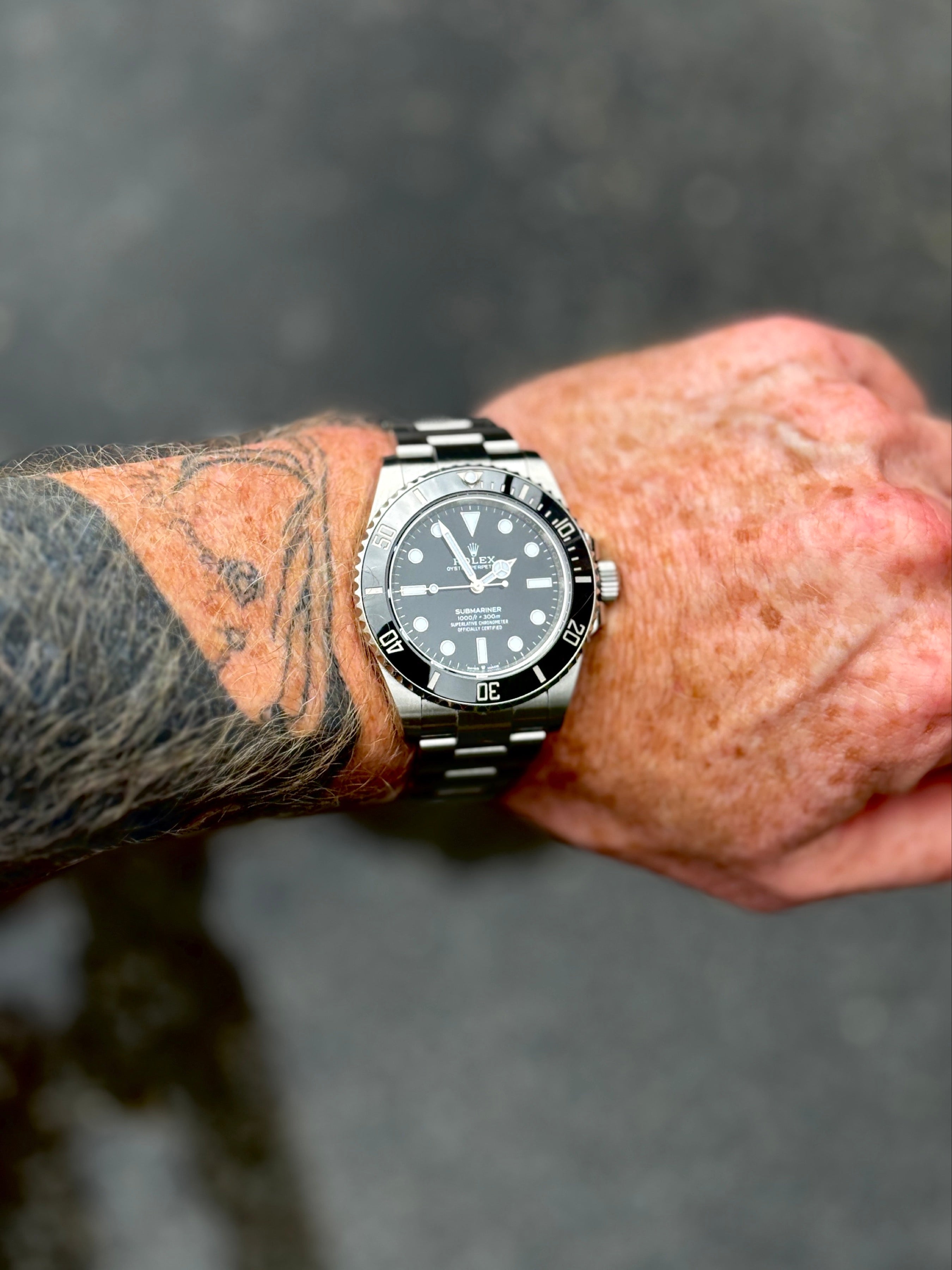 Pre-owned Rolex Submariner 124060 | steel black