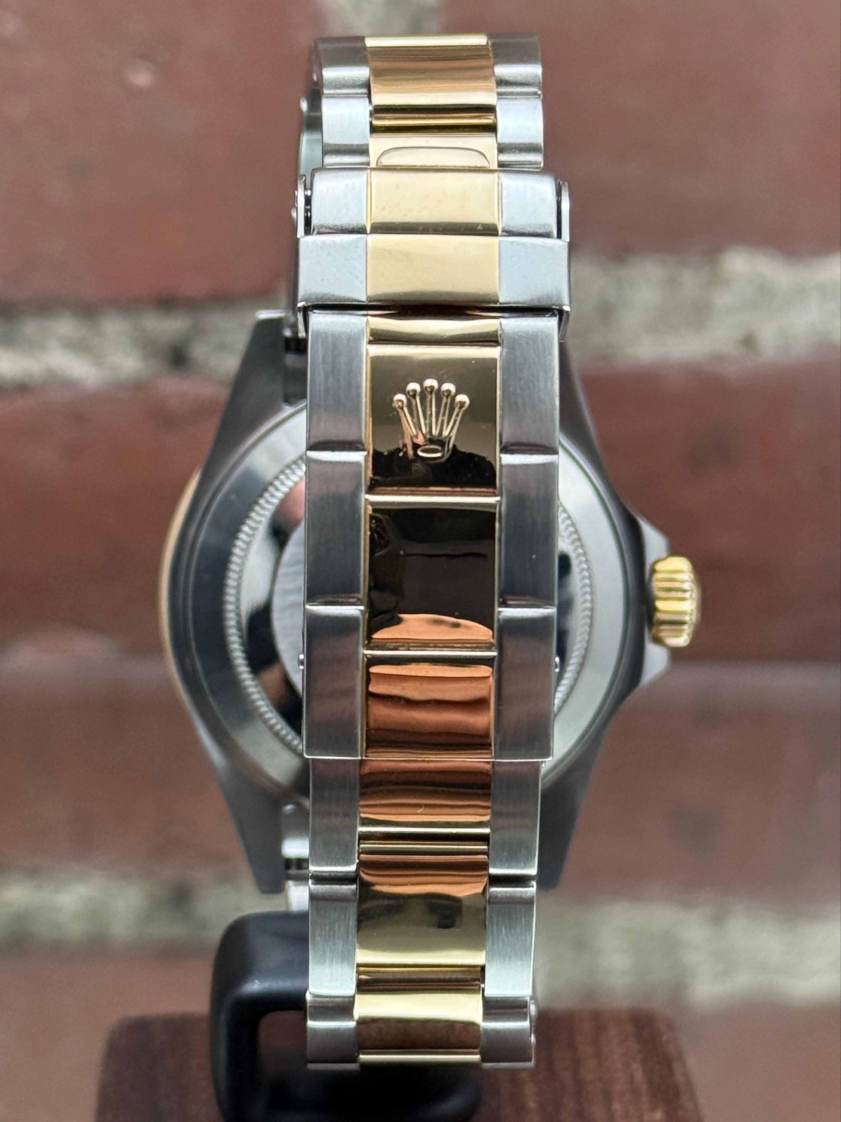 Pre-owned Rolex Submariner 16613 | Gold and Steel Blue