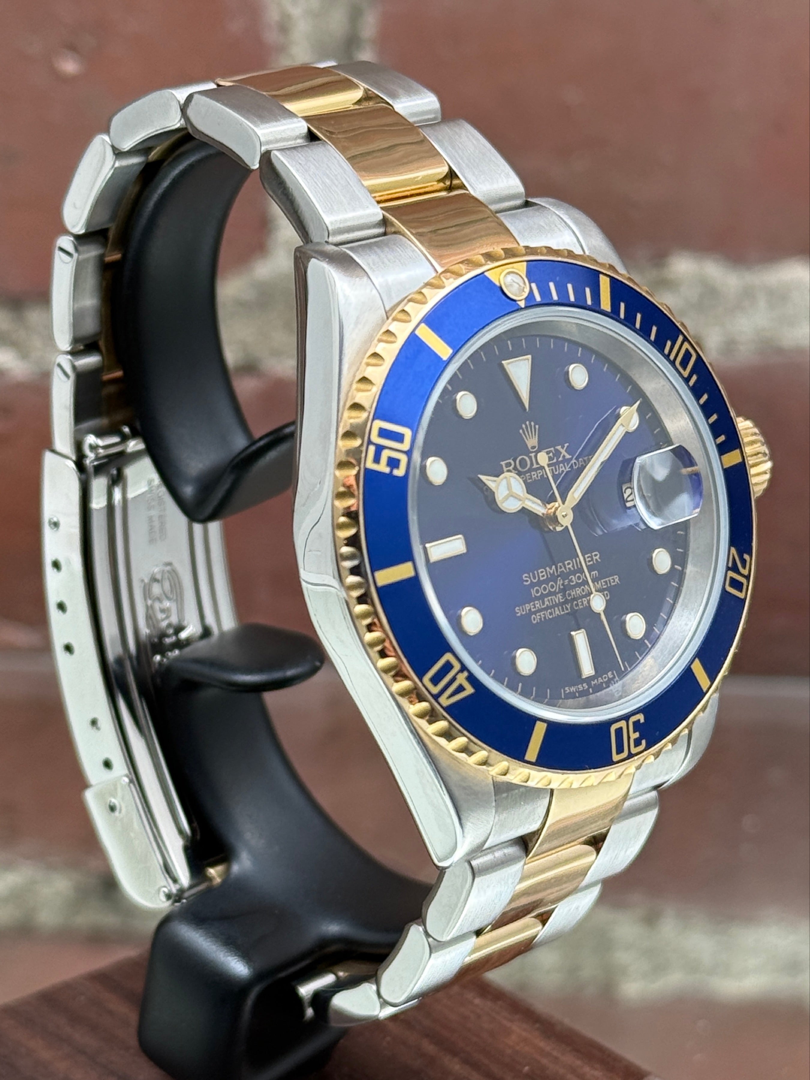 Pre-owned Rolex Submariner 16613 | Gold and steel Blue