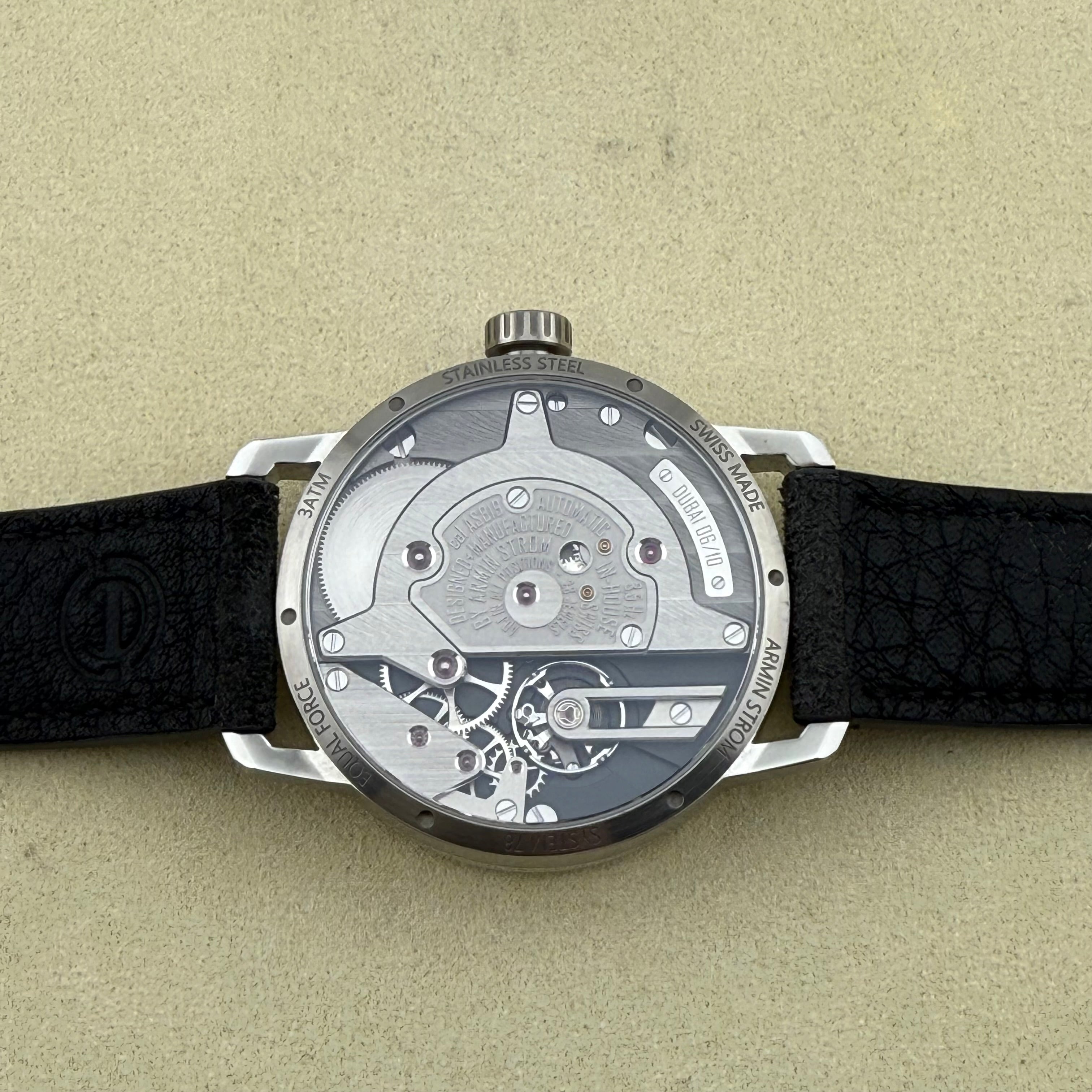 Armin Strom Gravity Equal Force Grey-toned sapphire dial, offset with Arabic subdial with rose gold finishes. Dial Dubai Limited Edition