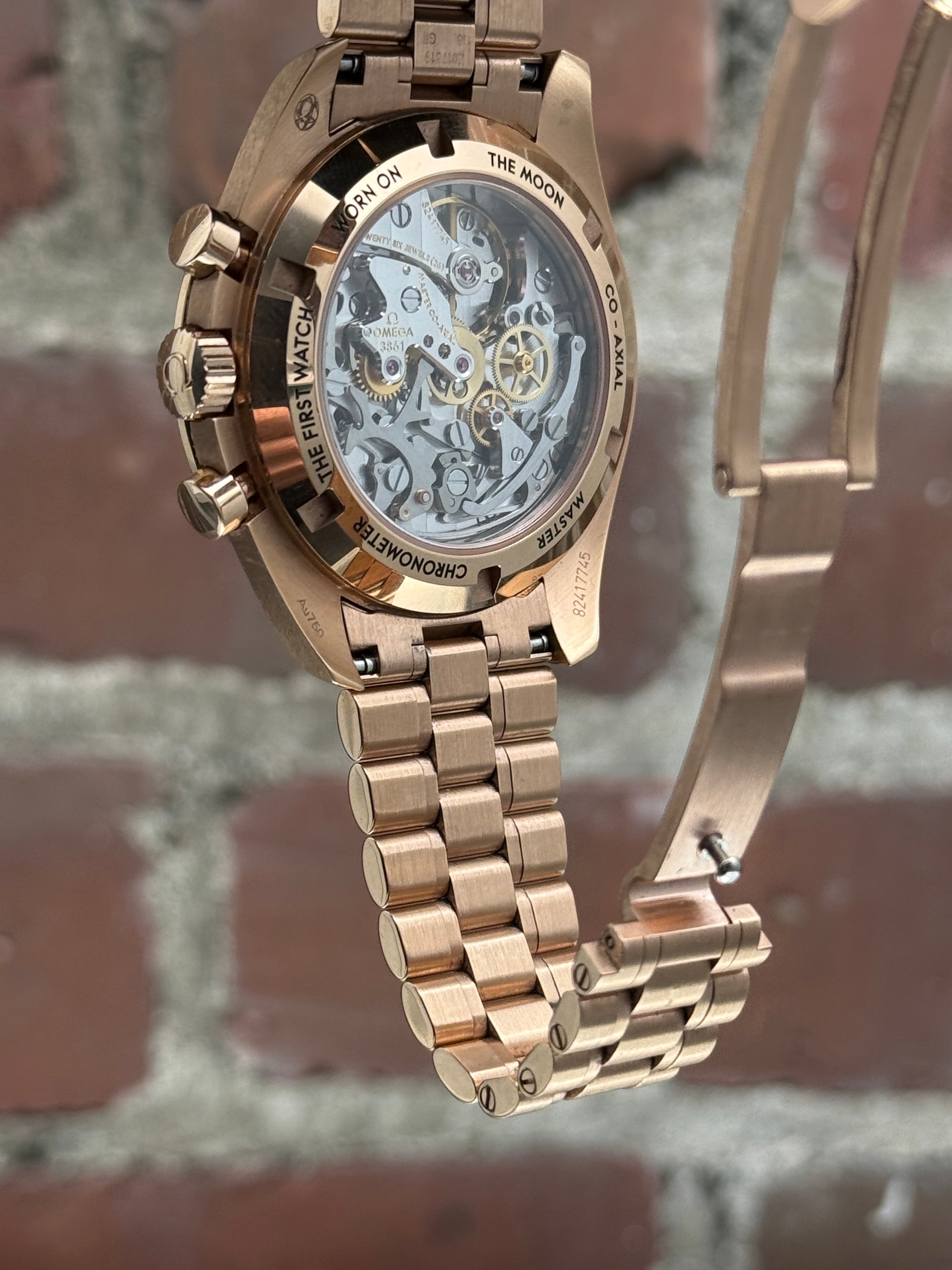 Pre-owned Omega Speedmaster Moonwatch Co-Axial Master Chronometer 310.63.42.50.01.001 | pink gold black
