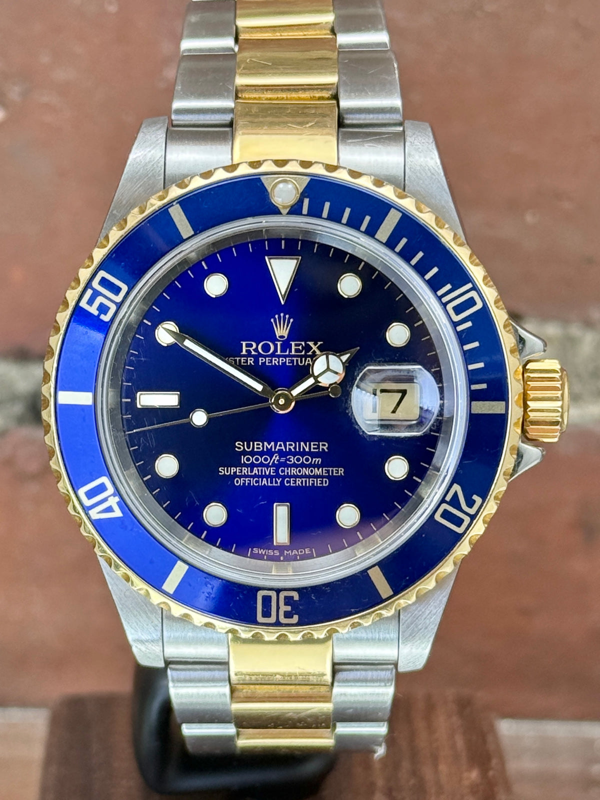 Pre-owned Rolex Submariner Date 16613 | Gold and steel Blue