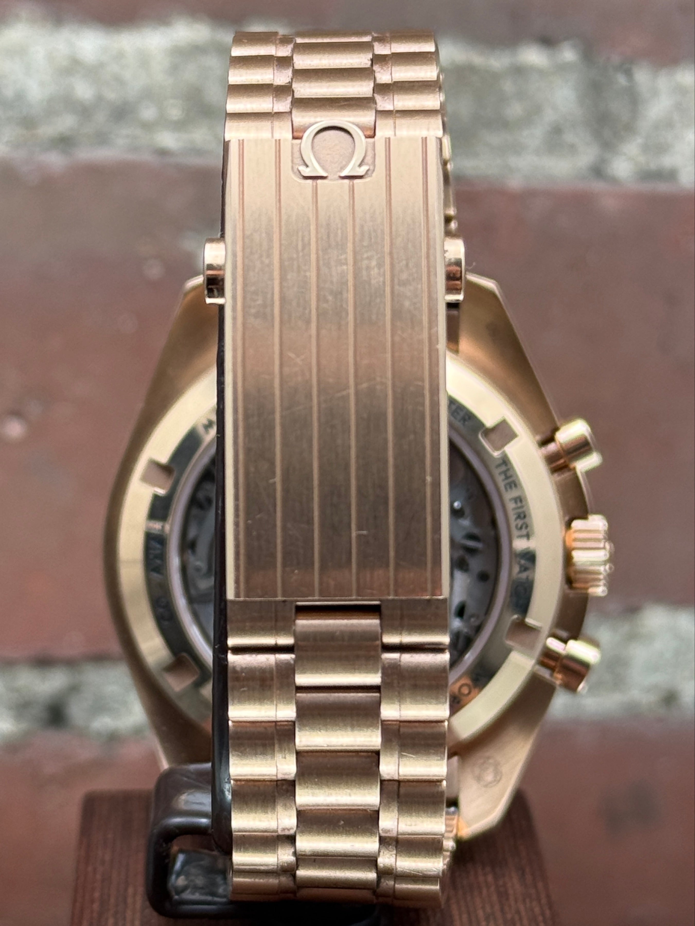 Pre-owned Omega Speedmaster Moonwatch Co-Axial Master Chronometer 310.63.42.50.01.001 | pink gold black
