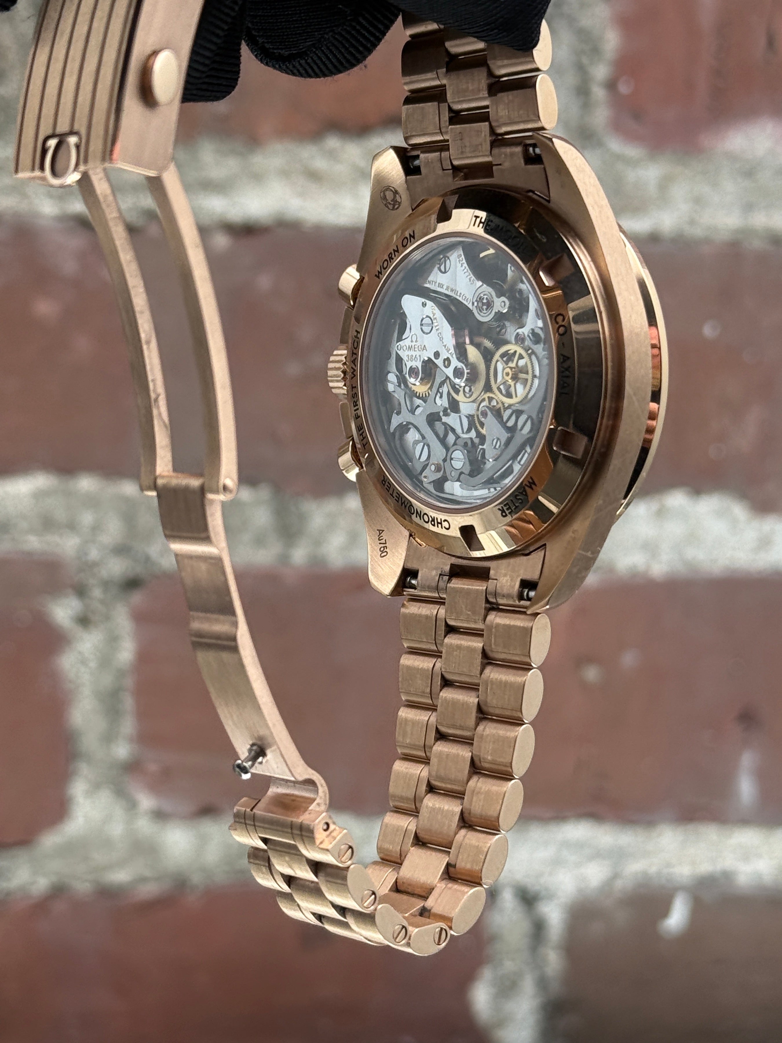 Pre-owned Omega Speedmaster Moonwatch Co-Axial Master Chronometer 310.63.42.50.01.001 | pink gold black
