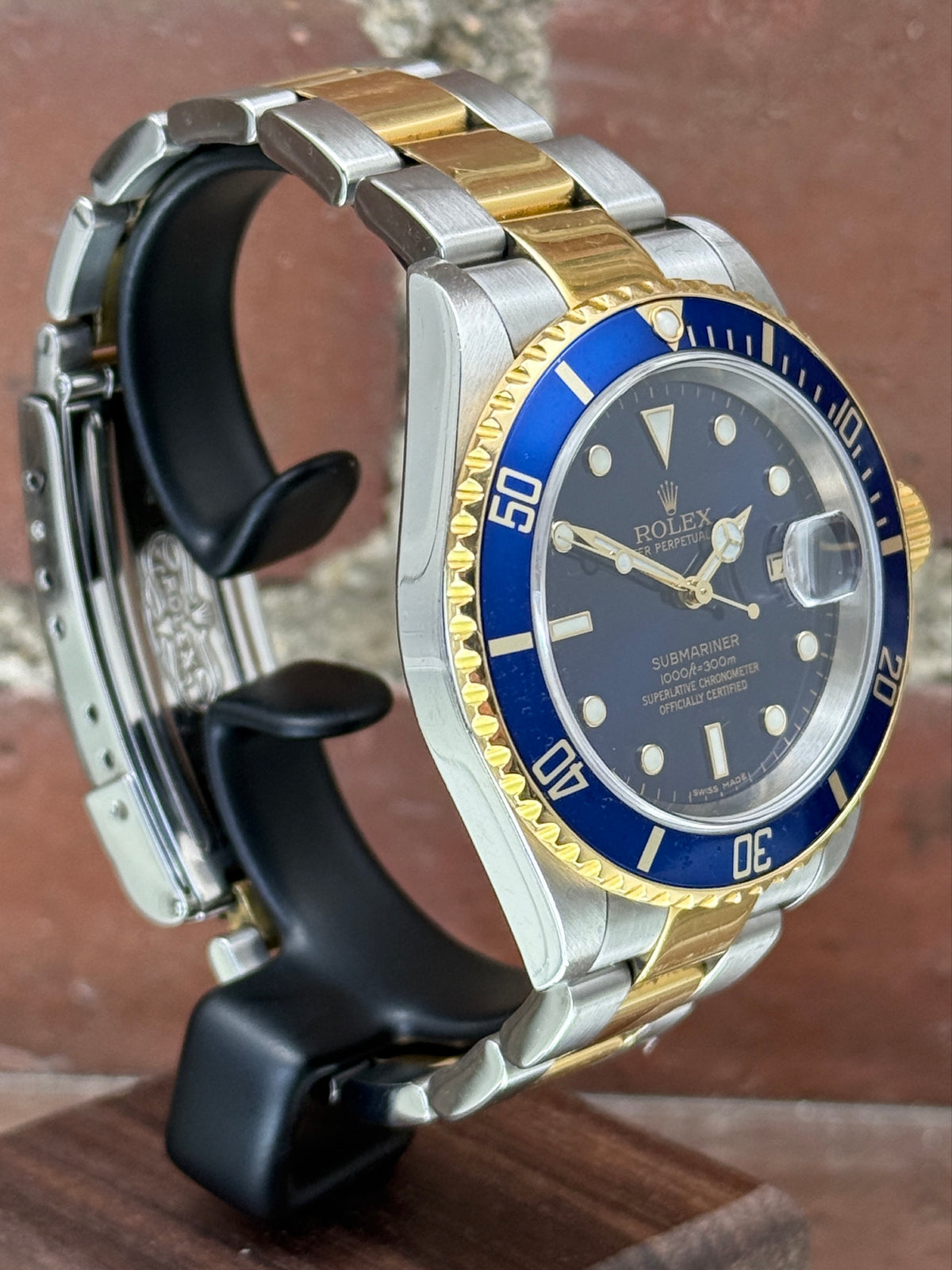 Pre-owned Rolex Submariner Date 16613 | Gold and steel Blue
