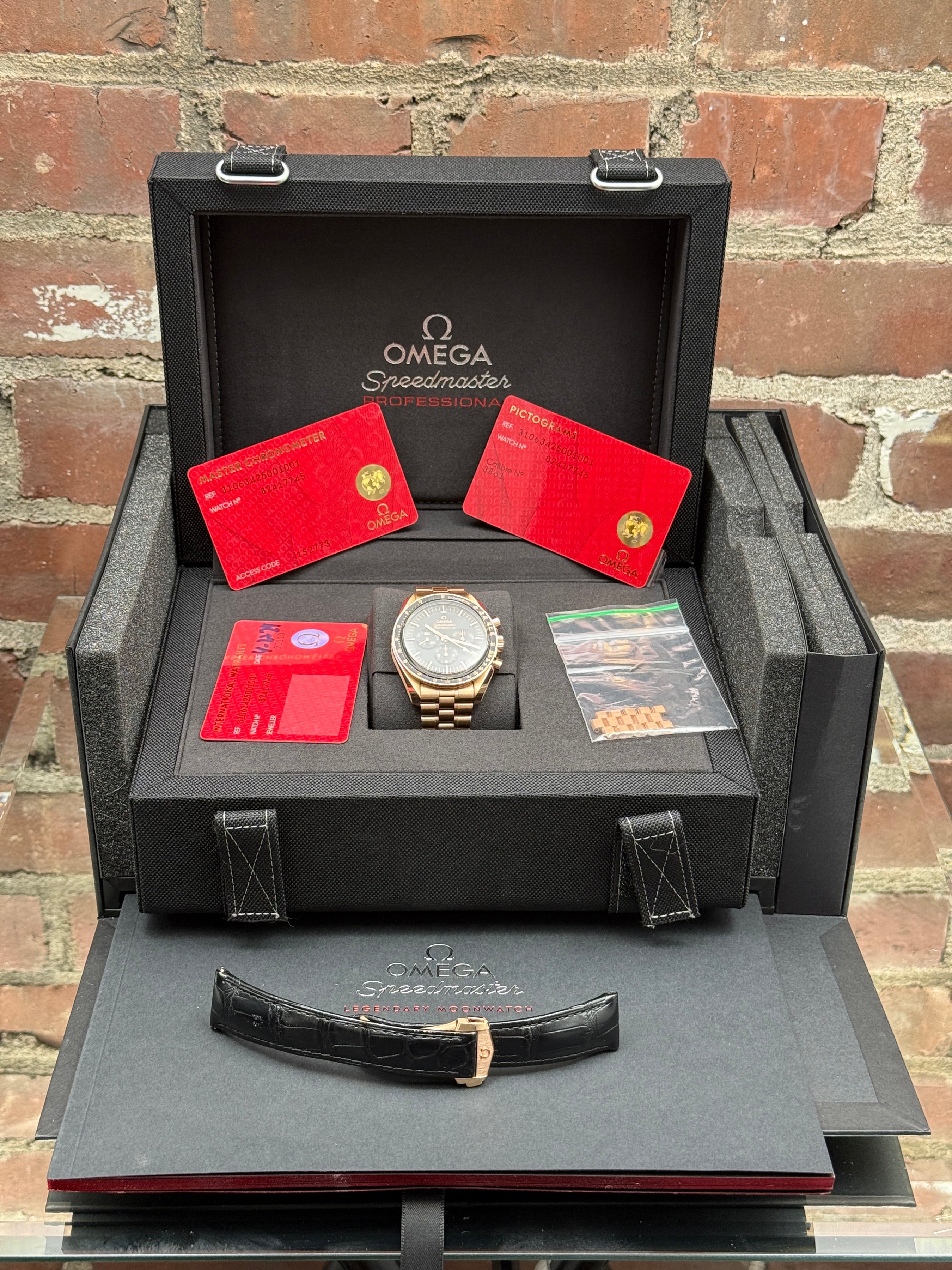 Pre-owned Omega Speedmaster Moonwatch Co-Axial Master Chronometer 310.63.42.50.01.001 | pink gold black