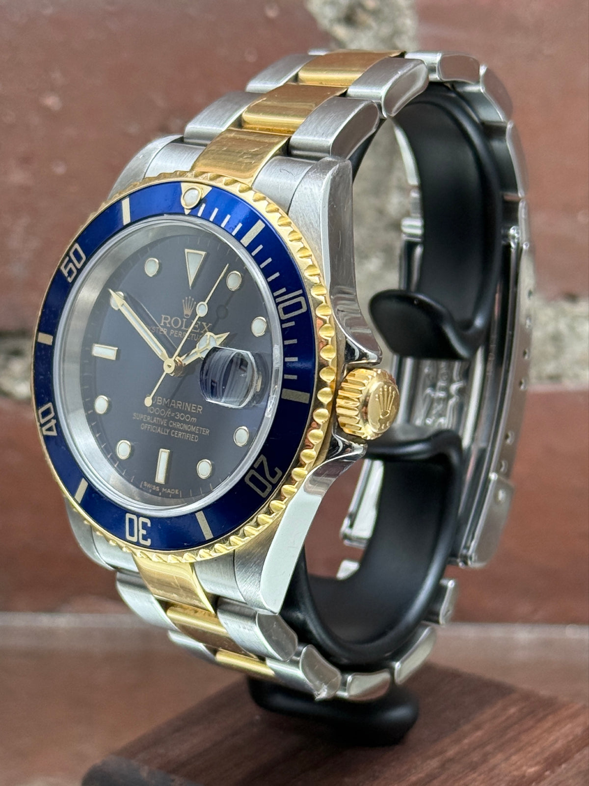 Pre-owned Rolex Submariner Date 16613 | Gold and steel Blue