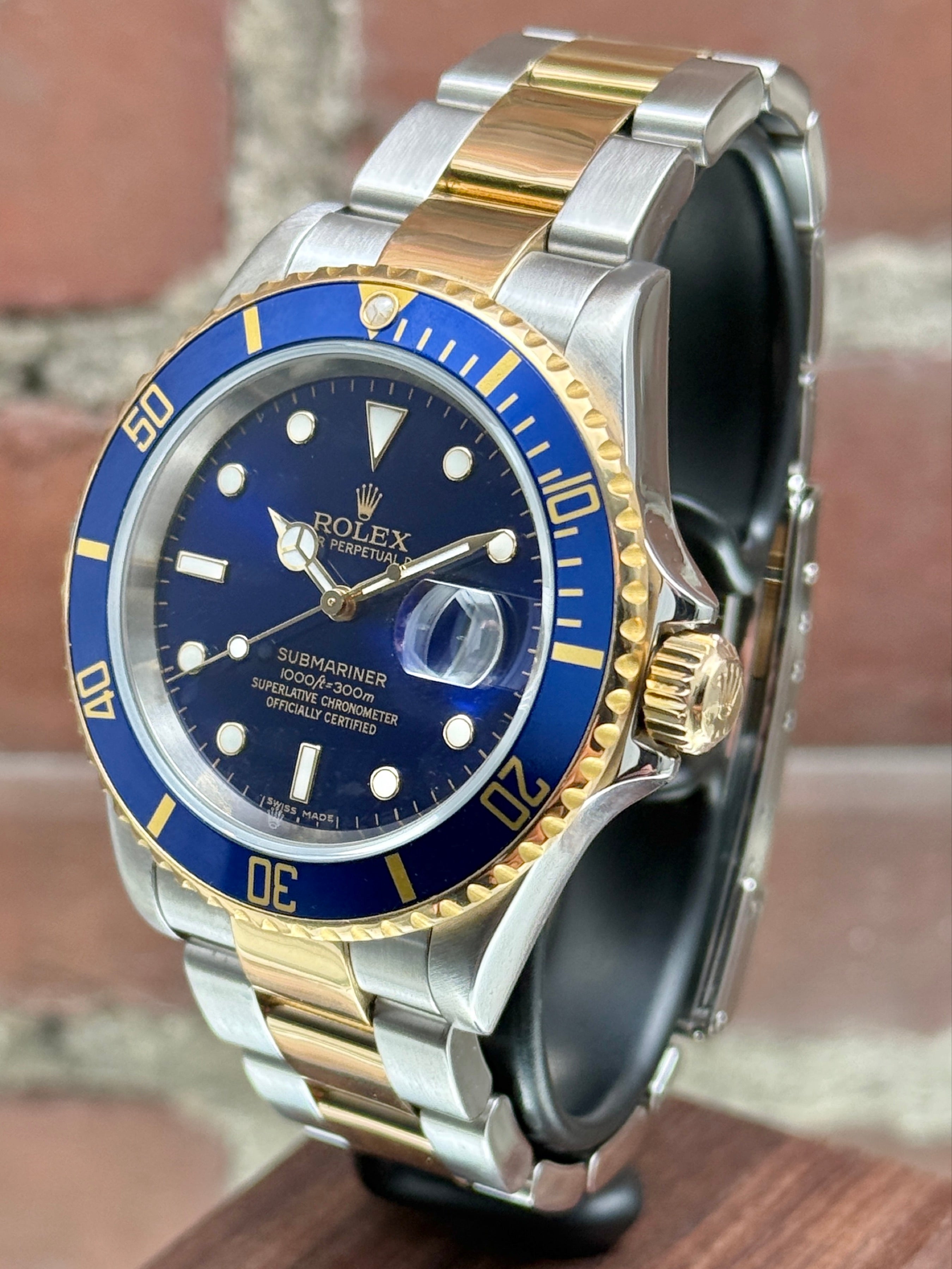 Pre-owned Rolex Submariner 16613 | Gold and steel Blue