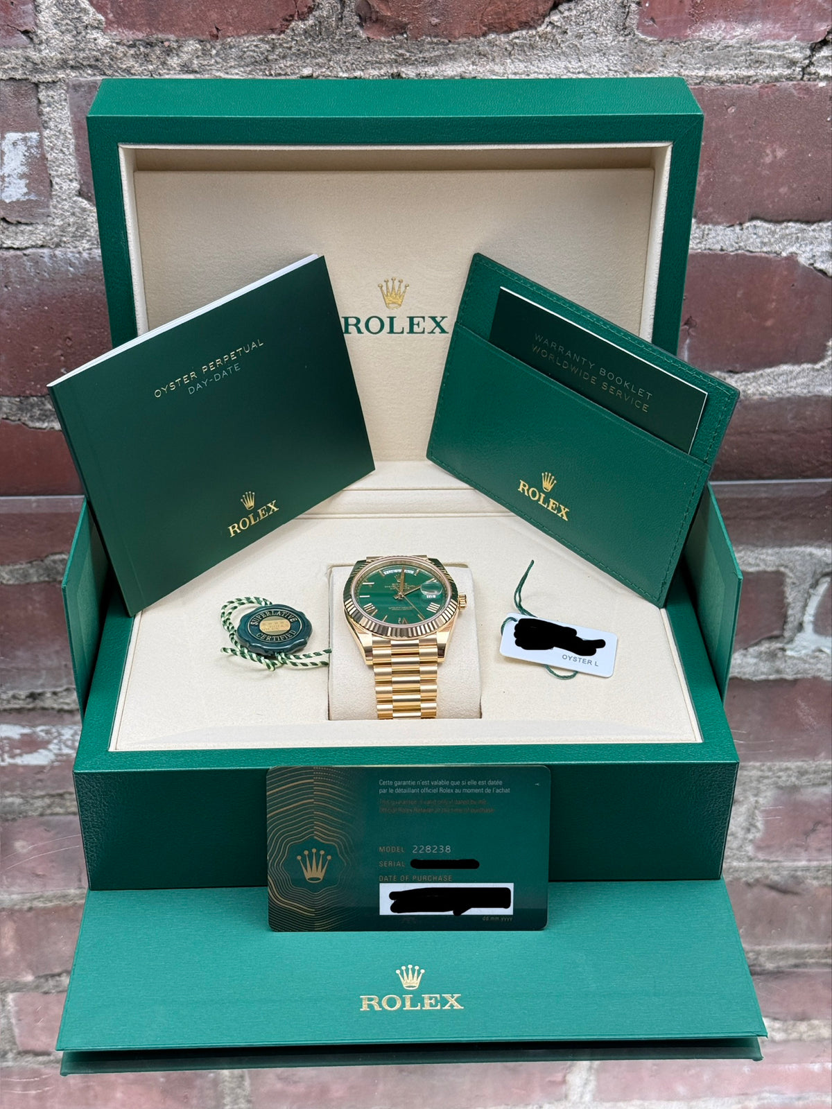 Brand new Rolex Day-Date 40 228238 | yellow gold green
