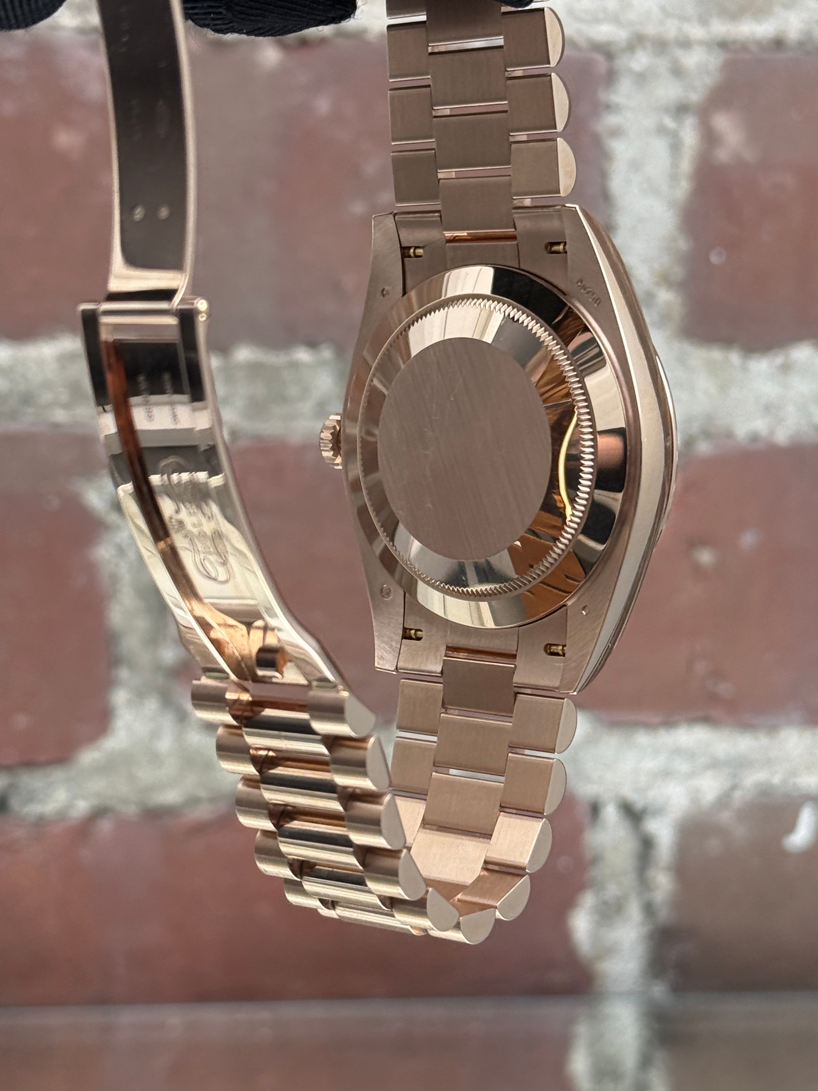 Pre-owned Rolex Day-Date 40 228235 | Pink gold Eisenkiesel